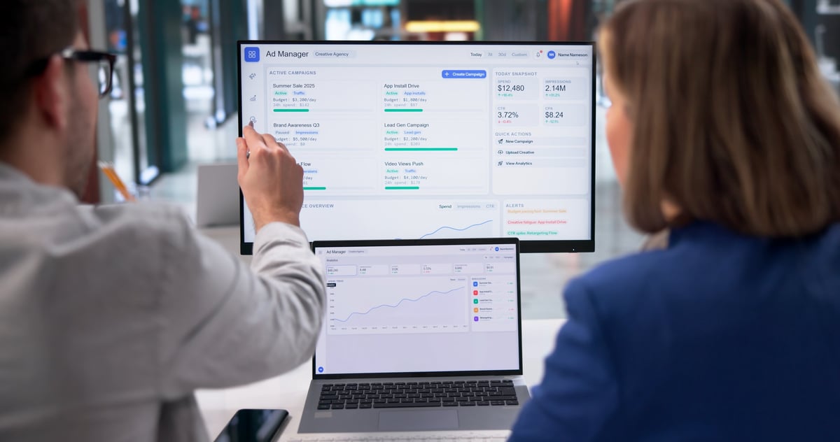 Marketing strategist reviewing campaign analytics on a laptop